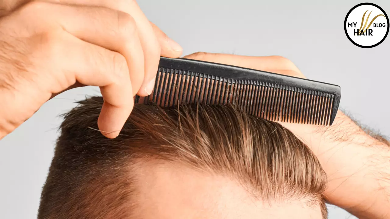 man combing hairs